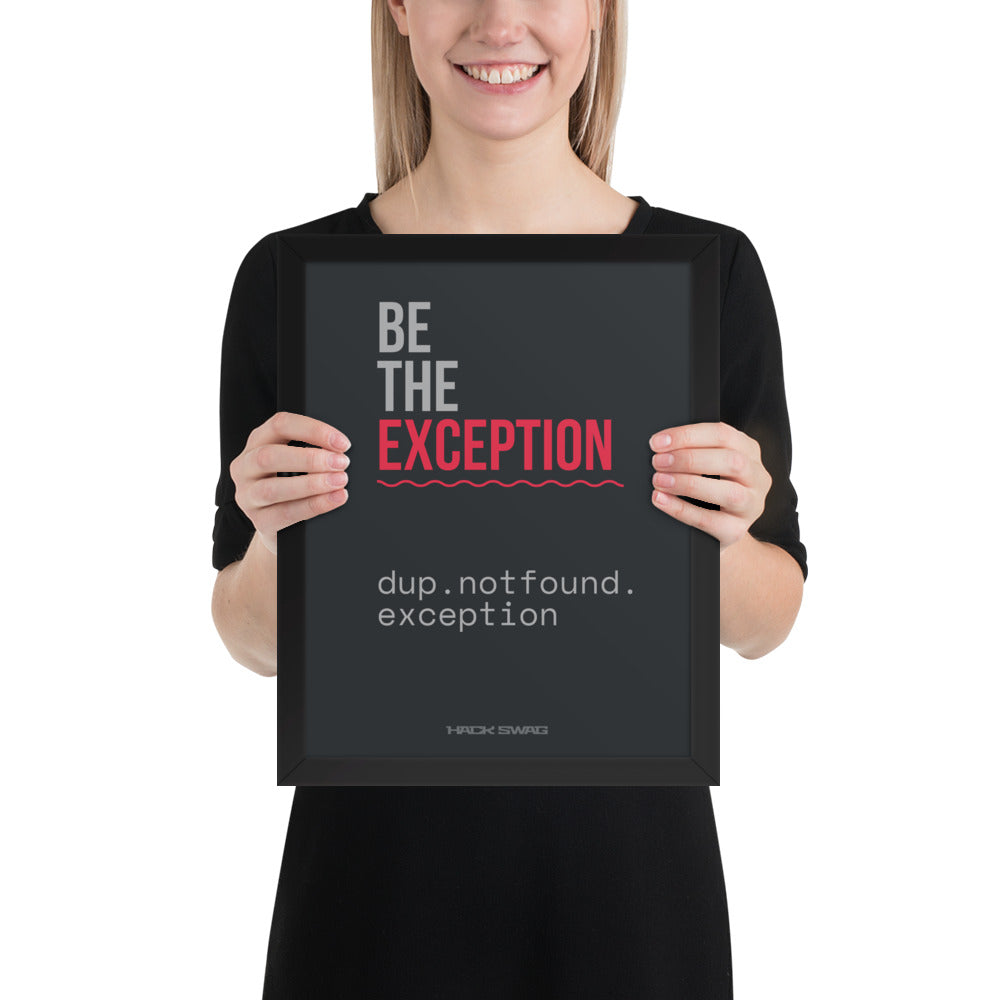 Person holding a framed black poster with motivational text 'BE THE EXCEPTION'