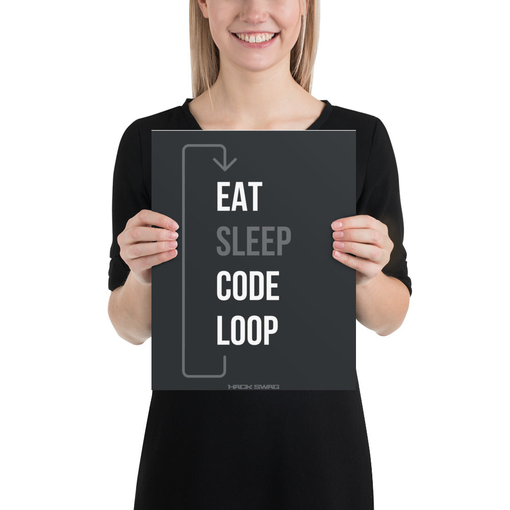 Product mockup- Person holding a black poster with 'EAT SLEEP CODE LOOP' text.
