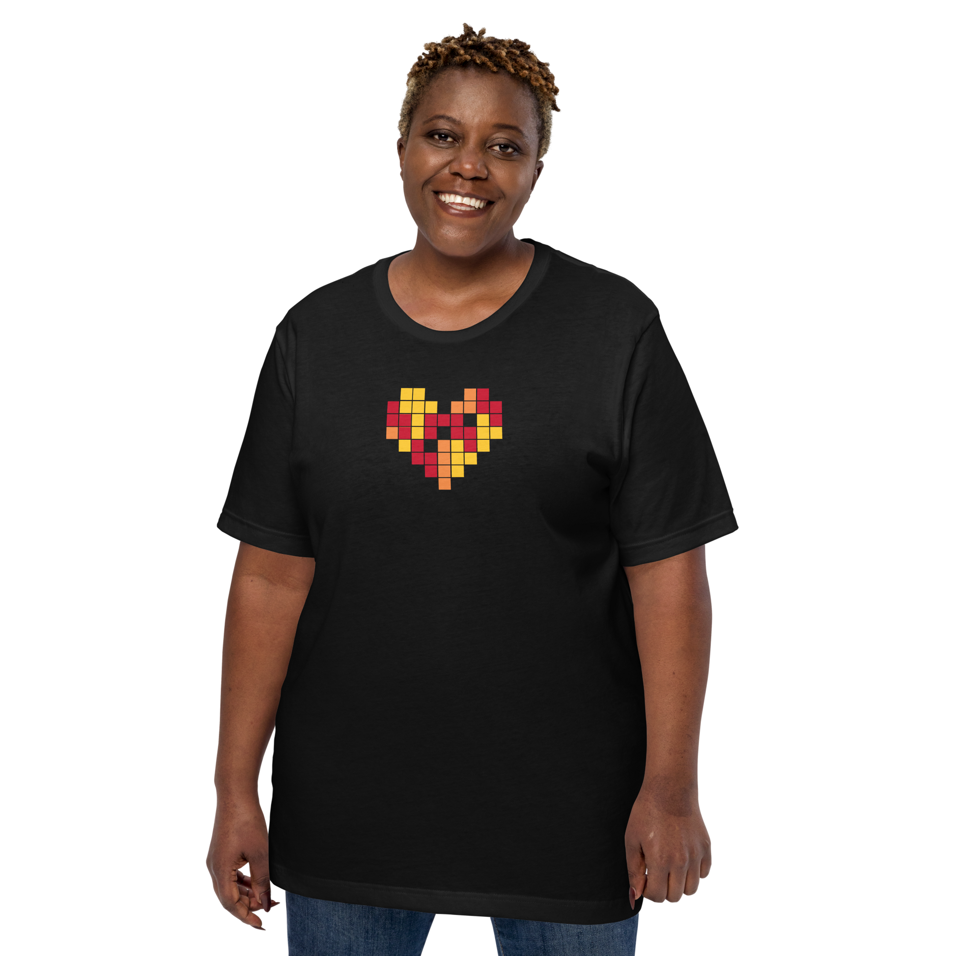 Person wearing a black t-shirt with a colorful heart design