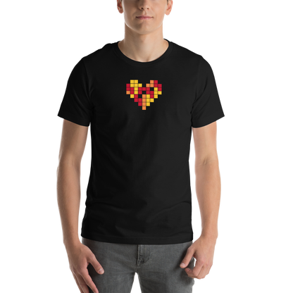 Person wearing a black t-shirt with a colorful heart design