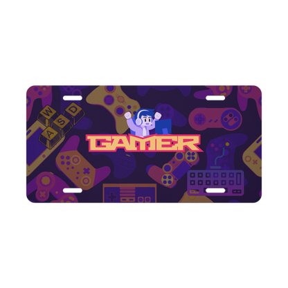 Gaming-themed license plate with joystick, controller, and 'Gamer' text on a purple background in dark mode.