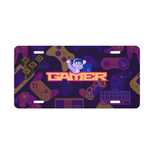 Gaming-themed license plate with joystick, controller, and 'Gamer' text on a purple background in dark mode.