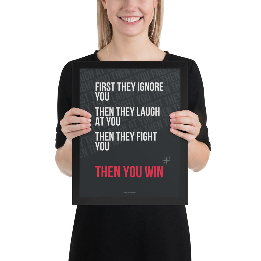 Person holding a framed motivational quote on a white background